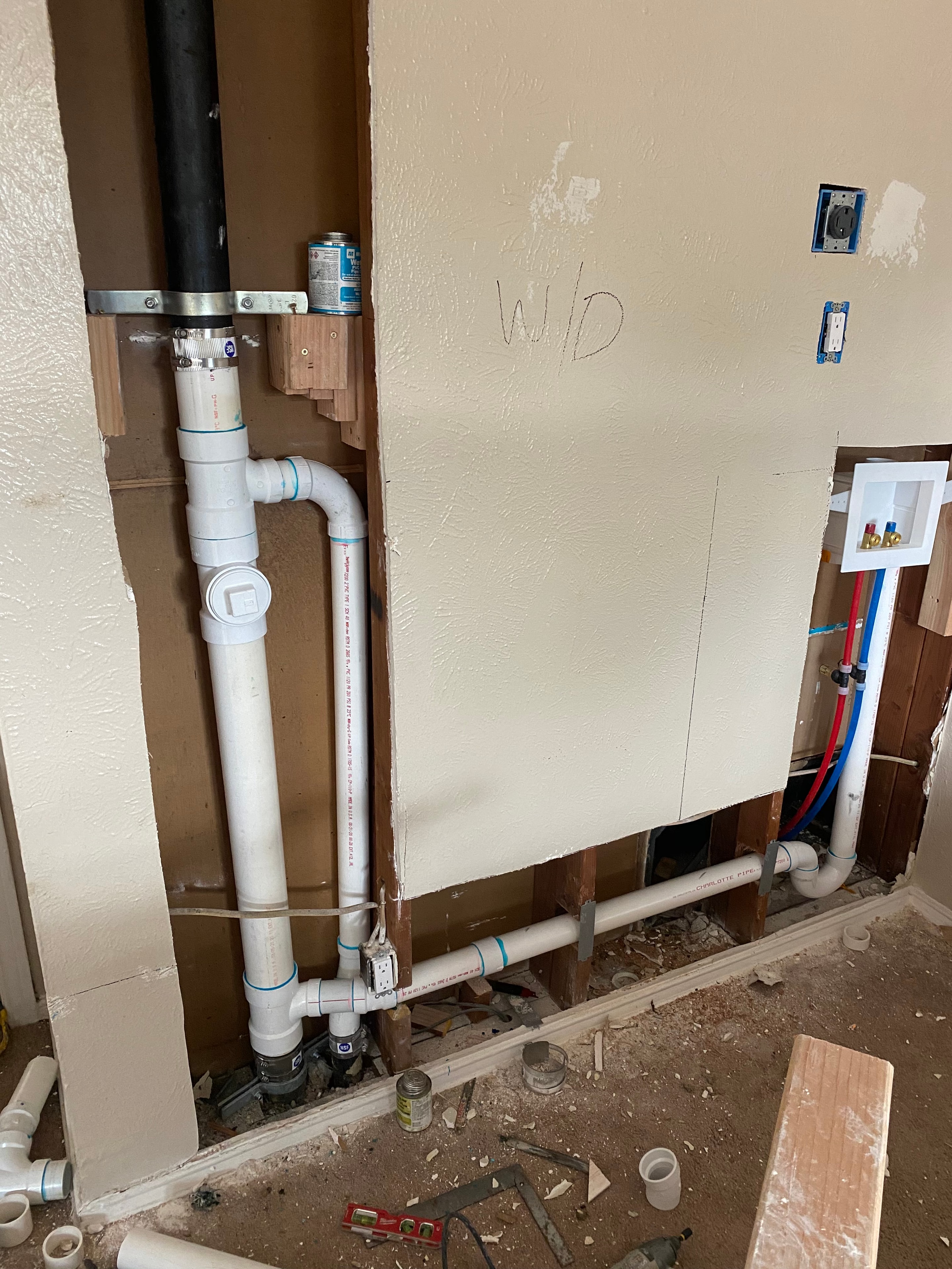 Rough-in plumbing during drywall renovation