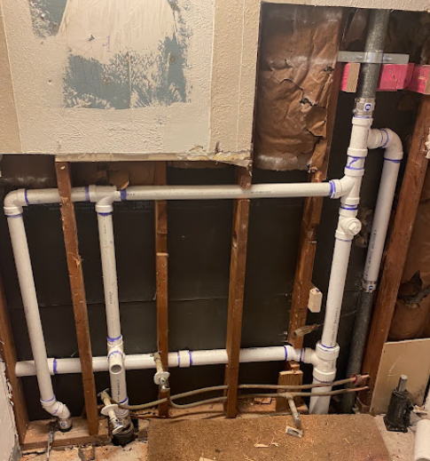 Close-up PVC rough-in plumbing installation
