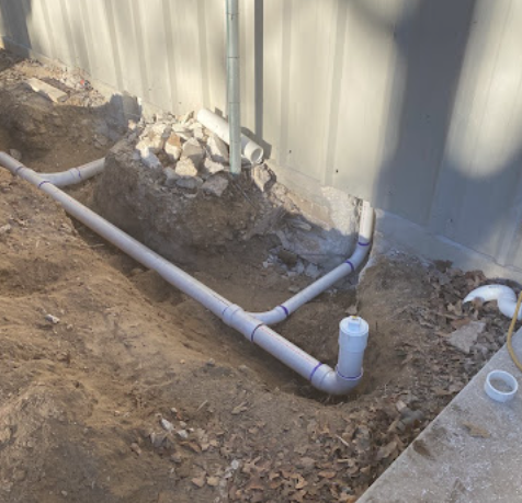 Underground drain and sewer pipe trench